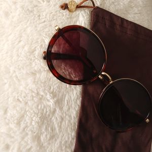 Sunglasses with Tory Burch bag